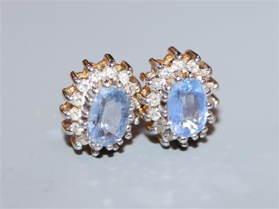 A pair of 9ct yellow gold, pale sapphire and diamond cluster stud earrings.
